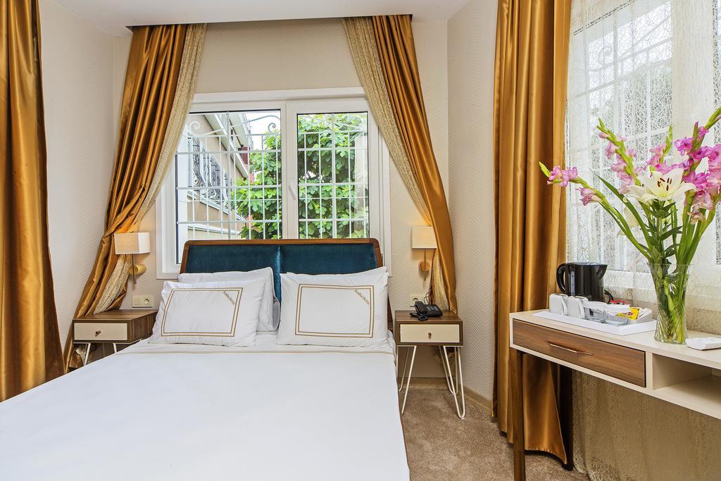 Almina Guest House Истанбул Стая снимка